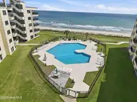 1505 Salter Path Road 334, Indian Beach, NC 28512 — 2-bedroom waterfront condo in Summer Winds Condominiums, Indian Beach, NC, photo 3 of 49: 6-print-DJI_20260505143748_0144_D