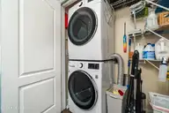 300 Sweetwater Cove, Newport, NC 28570 — 3-bedroom condo in The Coves at Newport, Newport, NC, photo 24 of 40: Laundry closet