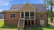 1453 Blue Heron Drive, Nashville, NC 27856 — 3-bedroom waterfront home in The Landing at Cooper Fields, Nashville, NC, photo 9 of 59: 8-web-or-mls-DJI_20260708152442_0587_D
