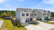 300 Currituck Drive, Holly Ridge, NC 28445 — 3-bedroom townhome in The Landing At Folkstone, Holly Ridge, NC, photo 2 of 31: 34_dji_20261001130054_0034_d