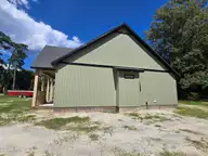 203 Gaston Drive, Elizabeth City, NC 27909 — 3-bedroom waterfront home in Newbegun Land, Elizabeth City, NC, photo 18 of 18: Side exterior