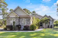 707 N Green Tee Road, Hampstead, NC 28443 — 3-bedroom waterfront home in Olde Point, Hampstead, NC, photo 2 of 62: 4_front exterior