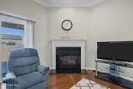 349 Crimson Drive, Winterville, NC 28590 — 4-bedroom home in Summer Winds, Winterville, NC, photo 8 of 32: Fireplace