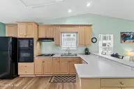 316 NE 52nd Street, Oak Island, NC 28465 — 3-bedroom home in Tranquil Harbor, Oak Island, NC, photo 5 of 49: 16_kitchen