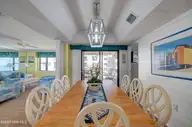1505 Salter Path Road 435, Indian Beach, NC 28512 — 3-bedroom waterfront condo in Summer Winds Condominiums, Indian Beach, NC, photo 14 of 28: Dining with a View