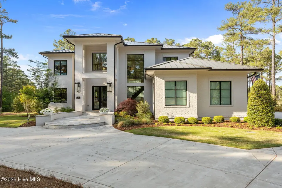 11 Elkton Drive, Pinehurst, NC 28374 — 4-bedroom waterfront home in Forest Creek, Pinehurst, NC, photo 1 of 71: Welcome to 11 Elkton Drive!!