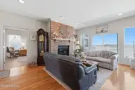 5 Osprey Circle, North Topsail Beach, NC 28460 — 3-bedroom waterfront home in Crystal Shores, North Topsail Beach, NC, photo 15 of 79: 14_living room