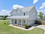101 Kings Harbor Drive, Holly Ridge, NC 28445 — 4-bedroom waterfront home in Kings Harbor, Holly Ridge, NC, photo 1 of 73: 5_DJI_0936