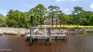 421 Old Swansboro Road, Newport, NC 28570 — 3-bedroom waterfront home, Newport, NC, photo 2 of 67: 57-web-or-mls-DJI_20250709125909_0898_D