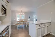 108 Hoffman Beach Road, Salter Path, NC 28512 — 3-bedroom waterfront home, Salter Path, NC, photo 16 of 42: View kitchen to diningjpg