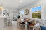 213 W Bogue Sound Drive, Atlantic Beach, NC 28512 — 3-bedroom waterfront home in Sound View Isles, Atlantic Beach, NC, photo 12 of 50: Dining area