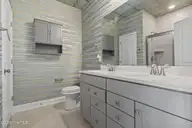 9410 Barnstormer Drive NW, Calabash, NC 28467 — 3-bedroom home in Eagle Run, Calabash, NC, photo 13 of 47: Primary Bathroom