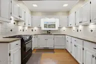 401 Yearling Drive, Goldsboro, NC 27534 — 3-bedroom home in Stratford Acres, Goldsboro, NC, photo 14 of 53: 401 Yearling Dr-Kitchen View 2