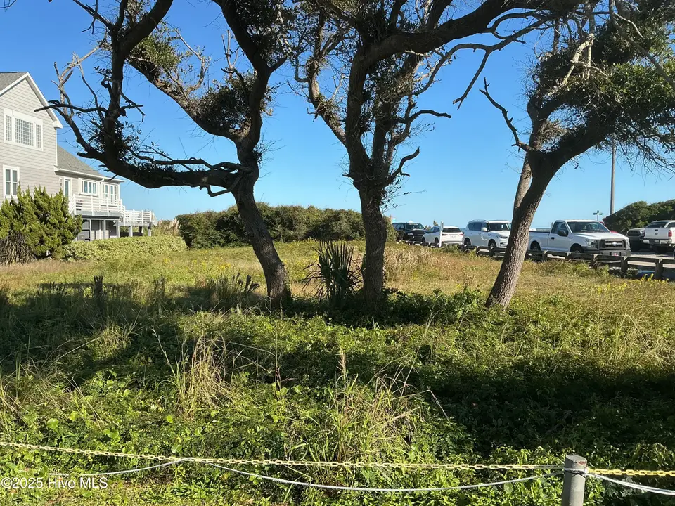 402 1 Fort Fisher Boulevard N, Kure Beach, NC 28449 — waterfront lot in Kure Dunes, Kure Beach, NC, photo 1 of 55: Front