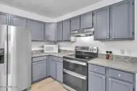 2507 E Oak Island Drive, Oak Island, NC 28465 — 3-bedroom home, Oak Island, NC, photo 10 of 62: 08-Final 2507 E Oak Island Dr-RJREM-8730