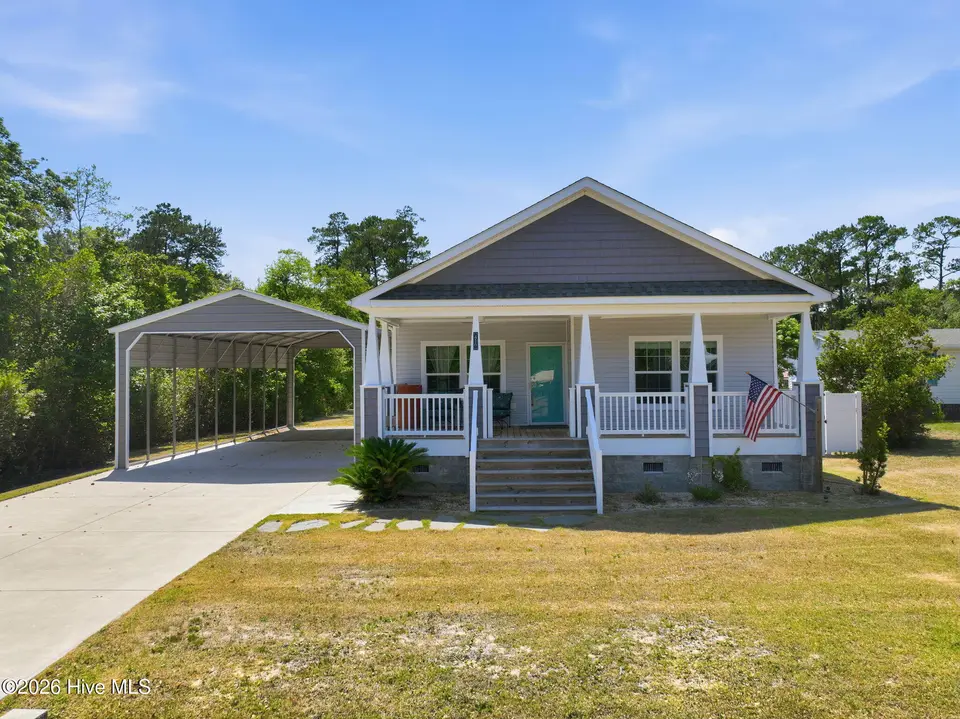 416 Ocean Spray Drive, Cedar Point, NC 28584 — 3-bedroom home in Ocean Spray, Cedar Point, NC, photo 1 of 46: 1-web-or-mls-416 Ocean Spray Dr 001_edit