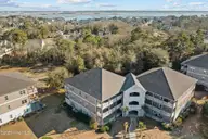 300 Lighthouse Lane A-3, Cedar Point, NC 28584 — 2-bedroom condo in Village at Magens Bay, Cedar Point, NC, photo 1 of 13: 300 aerial