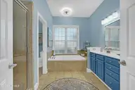 1226 Atrium Way, Leland, NC 28451 — 3-bedroom waterfront home in Waterford of the Carolinas, Leland, NC, photo 19 of 61: Primary Bathroom
