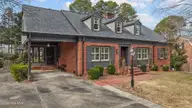 401 Brentwood Drive N, Wilson, NC 27893 — 3-bedroom home in Brentwood Forest, Wilson, NC, photo 2 of 38: Front Angle