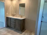 316 Commodore Drive, Rocky Mount, NC 27801 — 3-bedroom manufactured home in Eastfield, Rocky Mount, NC, photo 16 of 32: Master Bath view 1