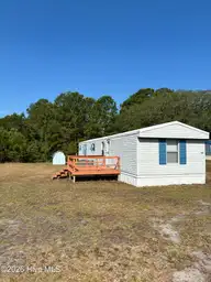 1541 Pelican Place SW, Shallotte, NC 28470 — 2-bedroom manufactured home in Shell Point, Shallotte, NC, photo 1 of 14