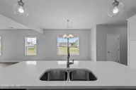 4208 Workman Loop 94, Leland, NC 28451 — 4-bedroom home in East Lake, Leland, NC, photo 10 of 25: Example - Kitchen Dining