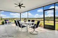 1331 Trisail Terrace, Wilmington, NC 28412 — 4-bedroom home in Riverlights, Wilmington, NC, photo 16 of 35: Large screened porch