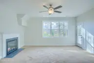 202 Broadleaf Drive, Jacksonville, NC 28546 — 4-bedroom waterfront home in Creekside at Aragona Village, Jacksonville, NC, photo 7 of 34: Living Area & Back door