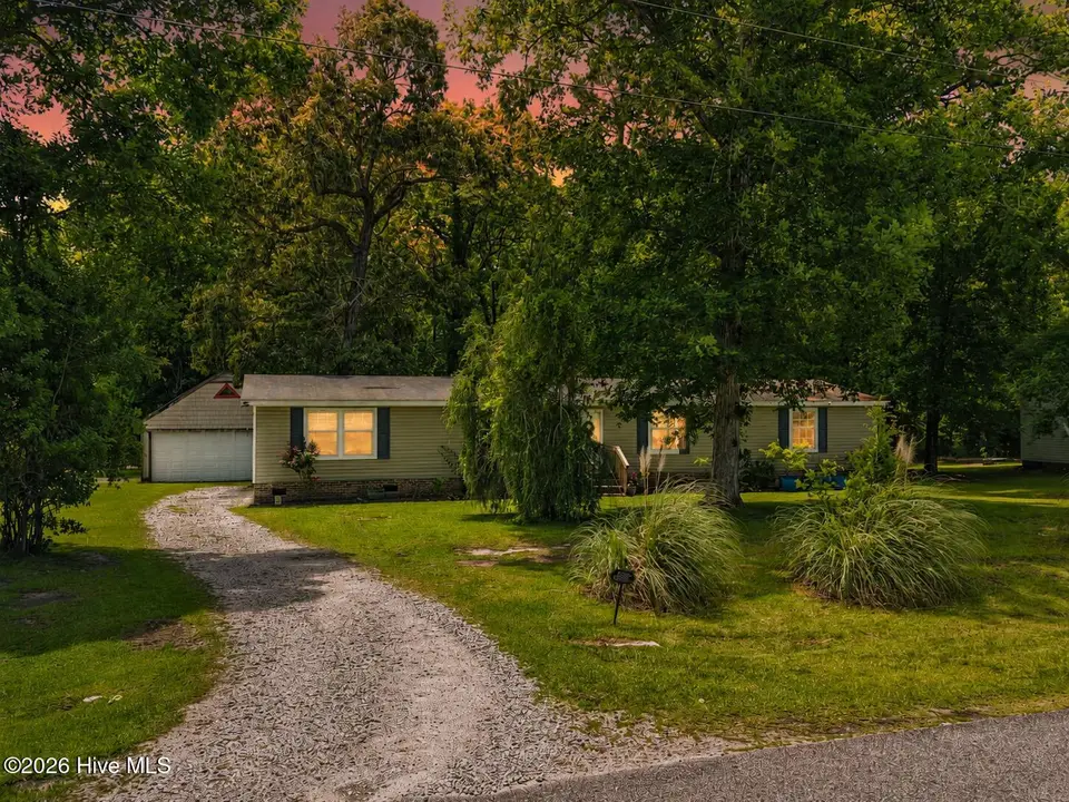 8695 Old Forest Drive NE, Leland, NC 28451 — 4-bedroom manufactured home in Old Forrest Estates, Leland, NC, photo 1 of 52
