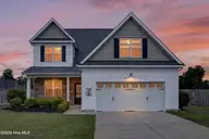 50 S Lord Wallace Court, Rocky Point, NC 28457 — 5-bedroom home in Brick Chimney Landing, Rocky Point, NC, photo 1 of 64: 50LordWallaceCourt-2_Dusk
