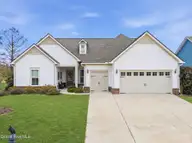 168 First Light Lane NW, Calabash, NC 28467 — 3-bedroom waterfront home in Crow Creek, Calabash, NC, photo 1 of 48: 168 First Light Ln