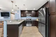 117 NE 19th Street, Oak Island, NC 28465 — 3-bedroom home in Tranquil Harbor, Oak Island, NC, photo 14 of 77: Kitchen