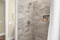 399 Summerhouse Drive, Holly Ridge, NC 28445 — 4-bedroom waterfront home in Summerhouse On Everett Bay, Holly Ridge, NC, photo 22 of 65: Spa style shower