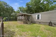 1709 Pompano Street SW, Shallotte, NC 28470 — 3-bedroom manufactured home in Shell Point, Shallotte, NC, photo 1 of 35