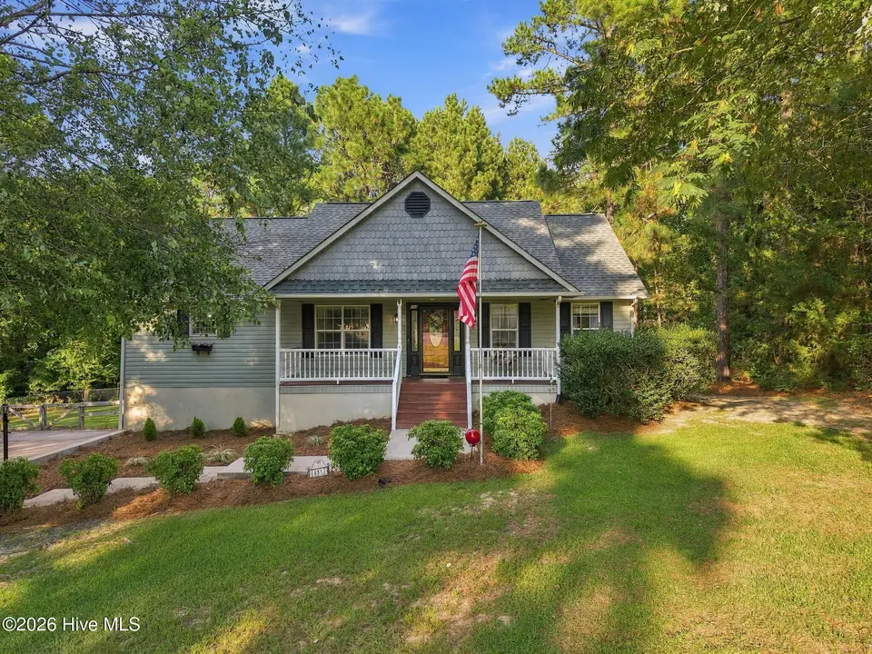 135 Pinesage Drive, West End, NC 27376 — 3-bedroom home in Pinesage, West End, NC, photo 1 of 52: 40-web-or-mls-DJI_20260911175154_0548_D