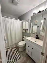1506 E Oak Island Drive, Oak Island, NC 28465 — 3-bedroom home in Tranquil Harbour Island, Oak Island, NC, photo 24 of 56