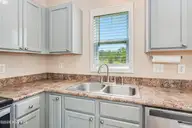 1261 S Brook Road, Winnabow, NC 28479 — 4-bedroom waterfront home in Mallory Creek Plantation, Winnabow, NC, photo 8 of 15