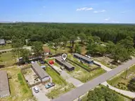 9366 Central Boulevard SE, Winnabow, NC 28479 — 3-bedroom manufactured home in Town Creek Estates, Winnabow, NC, photo 18 of 26: 02-DJI_20260527135225_0093_D-Edit