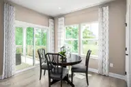 532 Planters Ridge Drive, Sunset Beach, NC 28468 — 2-bedroom home in Sea Trail Plantation, Sunset Beach, NC, photo 10 of 13: Dining