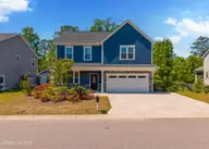672 Coniston Drive SE, Leland, NC 28451 — 4-bedroom home in Hawkeswater at the River, Leland, NC, photo 1 of 34: 672 Coniston Dr Edits MLS-4a