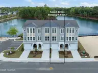 2656 Alvernia Drive, Castle Hayne, NC 28429 — 4-bedroom waterfront townhome in Sunset Reach, Castle Hayne, NC, photo 1 of 40: front of building