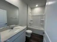 555 Coronado Avenue SE, Leland, NC 28451 — 4-bedroom home in Herring Shores, Leland, NC, photo 14 of 18: Guest Bathroom
