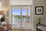 150 Lands End Court A42, Morehead City, NC 28557 — 3-bedroom waterfront condo in The Shores at Spooners Creek, Morehead City, NC, photo 13 of 50: Sliders out to covered deck