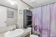 414 Sherrow River Drive SW, Shallotte, NC 28470 — 3-bedroom waterfront manufactured home in Sherrow River Estate, Shallotte, NC, photo 21 of 38: 23_414 sherrow river dr-00023