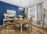 466 Eden Drive SW, Supply, NC 28462 — 4-bedroom home in Ruffin's River Lndg, Supply, NC, photo 6 of 41: Virtual Staged Dining Room