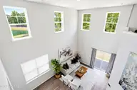 7590 Knightbell Circle, Leland, NC 28451 — 3-bedroom townhome in Ibis Landing, Leland, NC, photo 7 of 56: 18ft Living Room