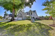 135 Darel Street, Rocky Point, NC 28457 — 4-bedroom waterfront home in Brick Chimney Landing, Rocky Point, NC, photo 4 of 72: Front