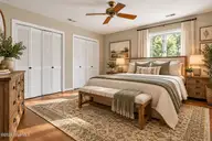 105 Pinehaven Court, Goldsboro, NC 27534 — 3-bedroom home in Pinemont, Goldsboro, NC, photo 22 of 33: Cozy Modern Rustic Farmhouse Bedroom
