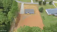 9757 Fire Tower Farm Road, Whitakers, NC 27891 — 3-bedroom manufactured home in Swift Creek Fire Tower, Whitakers, NC, photo 17 of 48: 18-web-or-mls-DJI_20260820132434_0558_D