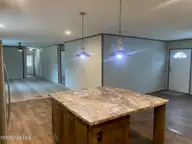 110 S 1st Street, Princeville, NC 27886 — 4-bedroom manufactured home, Princeville, NC, photo 6 of 26: Kitchen - Living Rm view